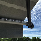 Power Awning with LED
Light Strip
Dual-Pitch, armless awning
retracts automatically in
high winds.